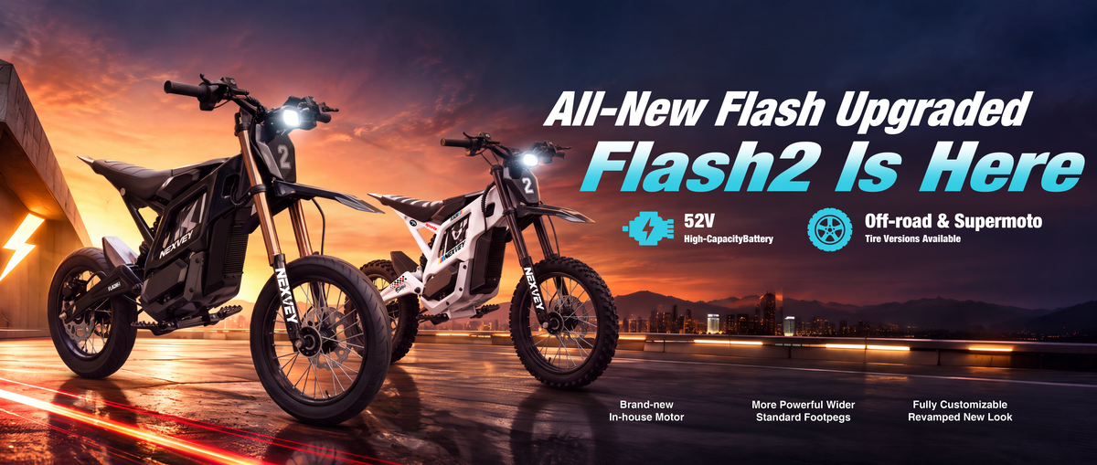 NEXVEY FLASH 2 black and white electric dirt bikes at sunset. 52V battery with off-road and supermoto tire versions available.