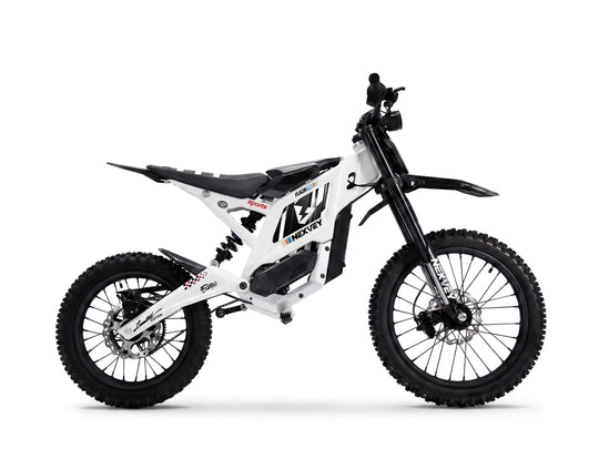 White NEXVEY Flash Pro youth electric motorcycle with off-road tires and full suspension isolated on white background.